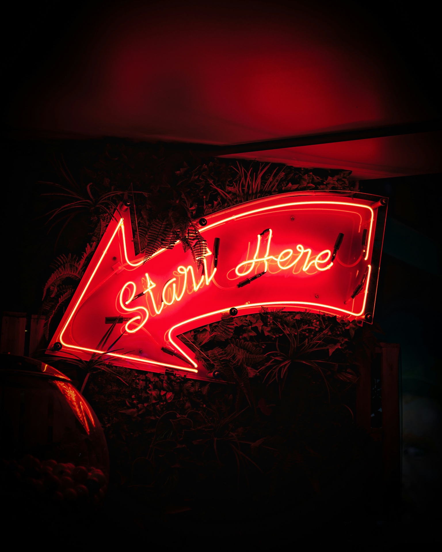 Start Here — neon sign for the AI Visibility Blueprint